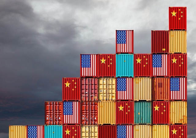 Cargo containers with Chinese and United States flags reflecting trade war and restrictions in export and import